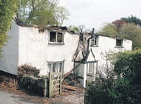 Blaze guts thatched cottages