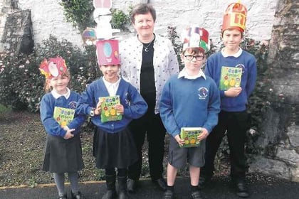Judge has a difficut task judging St Mary’s pupils’ Easter bonnets