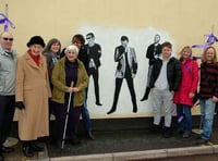 Street artist Mos restores Teignmouth's Muse mural