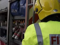 Fire crews battle a blaze at scrapyard