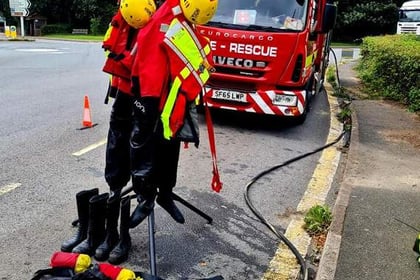 Fire crews called into action find ‘man laying face down in the river’  is a road sign