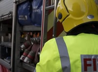 Firefighters battle blaze in asbestos roof