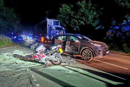 Two hurt in crash between motorbike and SUV