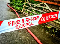 Firefighters battle blaze in combine harvester