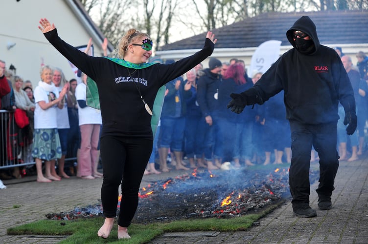 MDA140423A_SP024  Photo: Steve Pope 

Rotary Newton Abbot charity fire walk at Buckland Football Cub