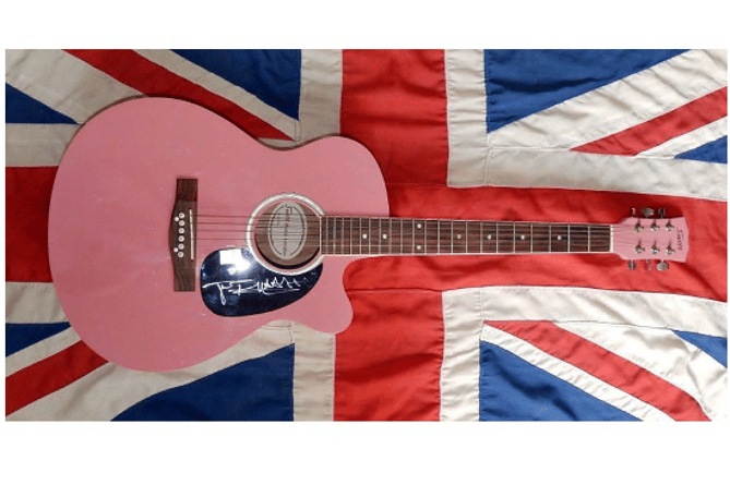 The guitar in question, signed by the Sex Pistols' Johnny Rotten