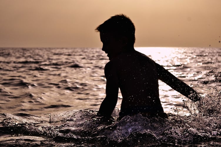 Boy in Sea.