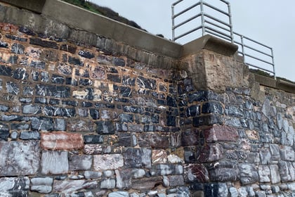 Storm damage to sea wall repaired