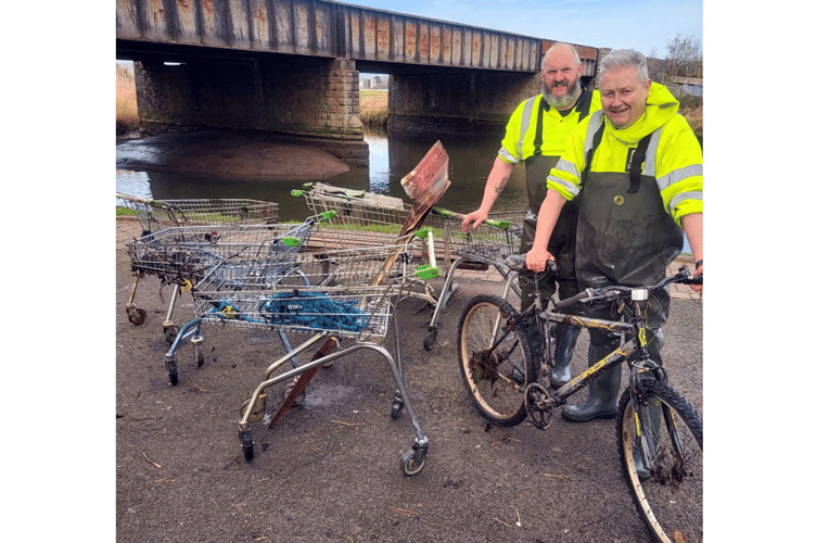 Newton Abbot Town Council’s facilities officers, Steve Ryan and Tony Little, with their haul after a days fishing
