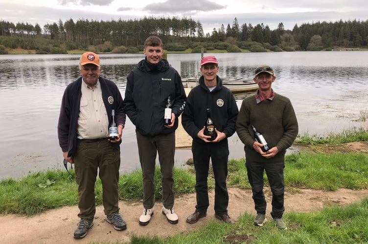 Winners pictured from left to right, Chris Bolt, Alex Venn of Willand who won the raffle draw prize, John Hern and Darren Penfold.