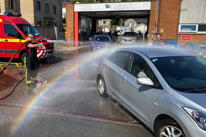 Firefighter's charity car wash raises record amount 