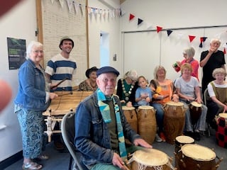 Bovey Tracey African drumming group Coombira Drum Circle at the World Fairtrade Day event