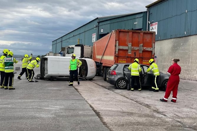 Firefighters practice an RTA drill at Teignmouth docks