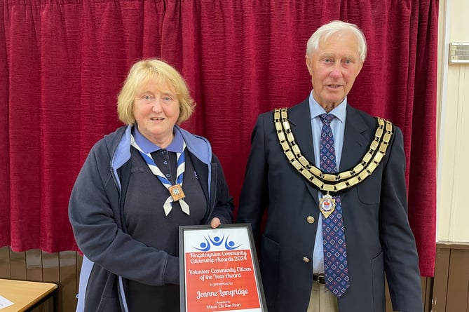 Jeanne Langridge is presented with her well-deserved  Citizenship Award by Kingsteignton mayor Cllr  Ron Peart 