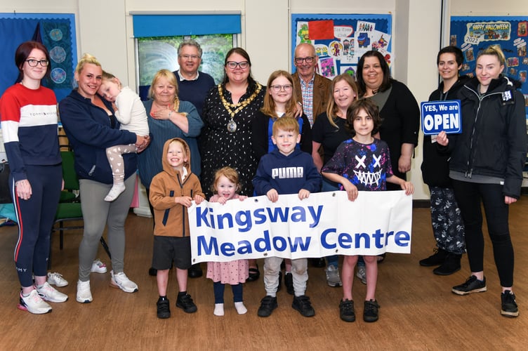 Meadow Centre reopens:L-R Trustee Chloe Brinicombe, Trustee Sabrina Merrilees, Trustee Karen Ryding, Councillor David Cox, Teignbridge Council Chair Rosie Dawson, Councillor David Palethorpe, Trustee Sarah Coy, Trustee Sarah Holmes and Maizey Lannigan. (Photo: David Caunter)