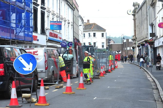 Here upon these stones, We will build our barricade. Fencing goes up in Newton Abbot's Queen Street as the controversial improvement plans get underway