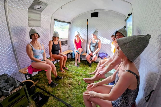 Socialising in Devon's only pop up wild sauna tent