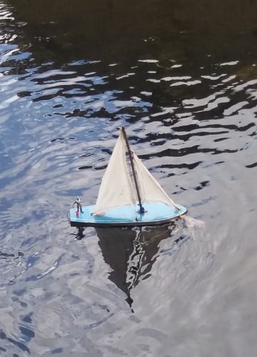 Toy boat on the water