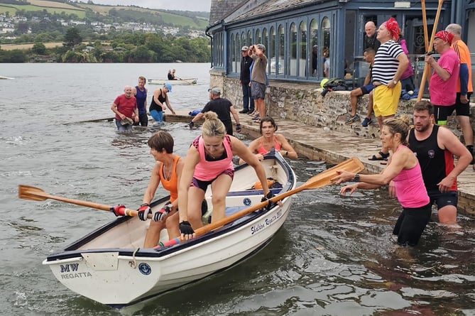 Crew change for the Barham Cup dinghy relay race from Teignmouth to Newton Abbot