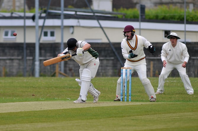 Devon Cricket League B Division. Bovey Tracey 2nd XI versus Ipplepen 1st XI. Bovey's Arren De Young and Ipplepen 'keeper Mawgan Penrice .  A 43 run win for Bovey who batted first reaching 184 for 5 off 41 overs. Ipplepen had a revised target of 186 to reach off 41 overs but were all out for 142 after 34 overs