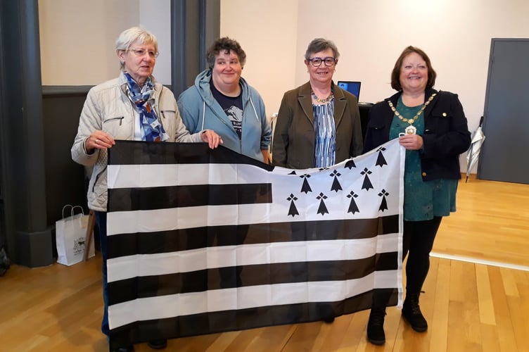 Dawlish Twinning Assocation exchanging gifts with French hosts 