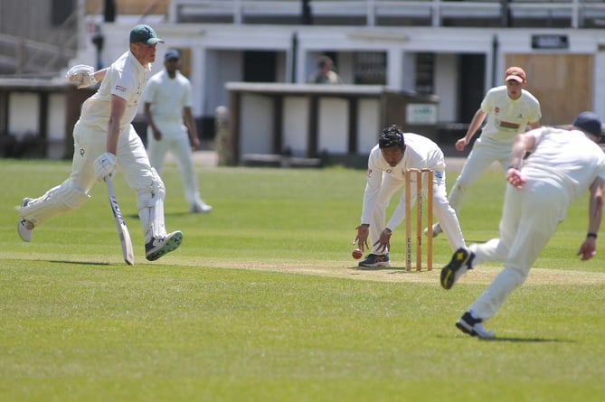 Devon Cricket League E Division West. Torquay and Kingskerswell 2nd XI versus Chagford. Chagford skipper Griffiths beats the ball to the crease

