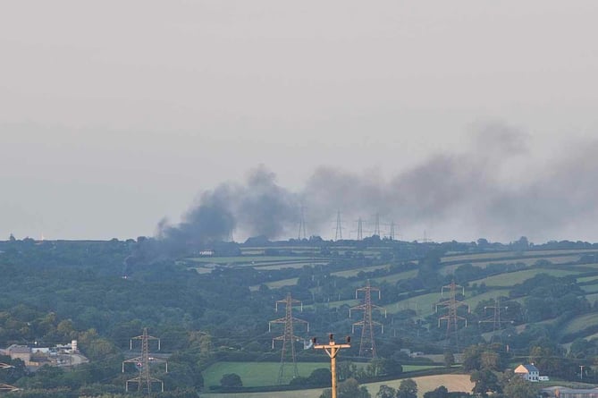 Pall of smoke rising from the lorry fire on the A38. Photo: James Crook