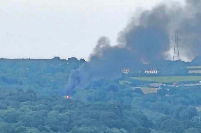 Pall of smoke rising from the lorry fire on the A38. Photo: James Crook