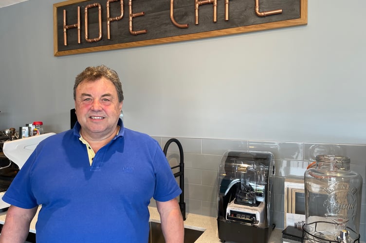 Manager Mike Atkinson stands behind the counter at the Hope Cafe in Dawlish