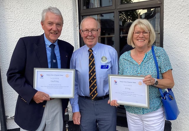 Community Champions Dawlsih Water Rotary. Geoff and Jill King receiving their awards from Dawlish Water Rotary Club President Chris May.