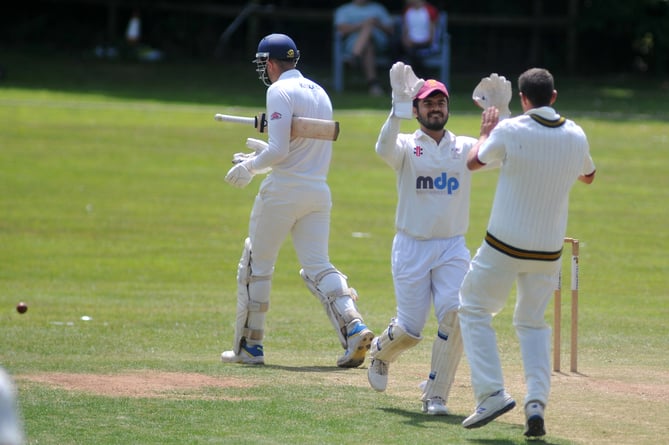 Devon Cricket League B Division. Ipplepen versus Stoke  Gabriel. Stoke 'keeper Abhishek Anand happy at catching J Colgate out off a ball from Mike Smith.  