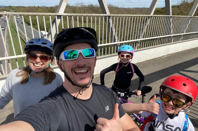 Claire and Simon Holden with children Ava and Henry training for their coast to coast cycle ride