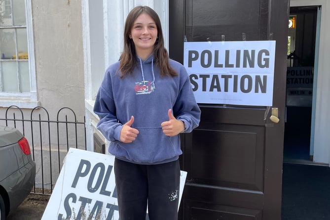 Roxanne Wilson who turned 18 yesterday arrives at a polling station in Teignmouth