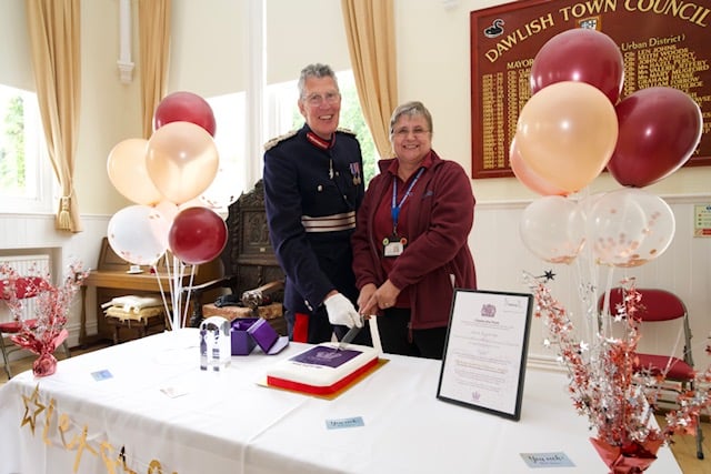 Assist Teignbridge receive King's Award. Lord Lieutenant of Devon David Fursdon with volunteer co-ordinator Chrisi Marshall. Photo Bob Simpson 