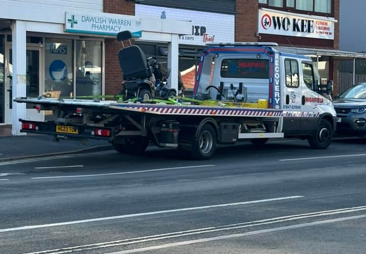 The damaged mobility scooter on a recovery truck at Dawlish Warren