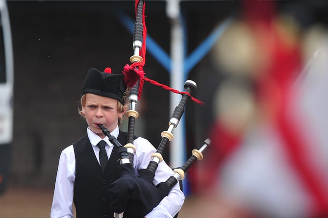 Chudleigh Carnival. A young piper from City of Exeter Pipe and Drums