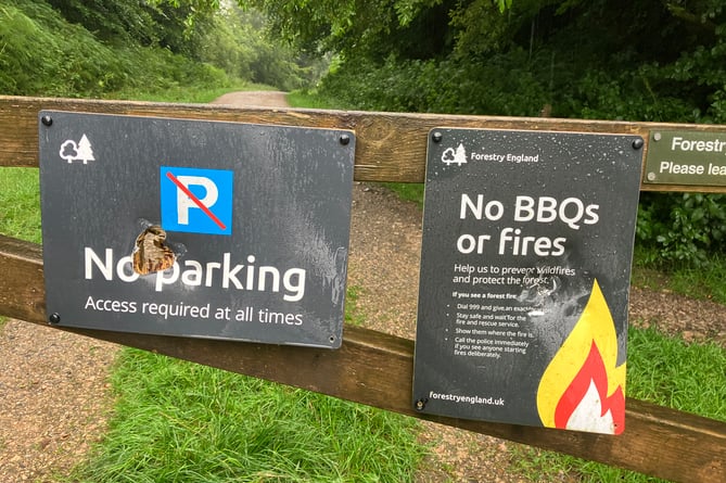 Damaged signs at Haldon Forest. PhotoForestry England/Crown copyright.