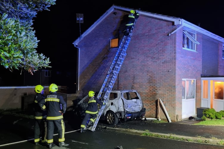 Firefighters from Newton Abbot tackle car fire. Photo Newton Abbot Fire Station