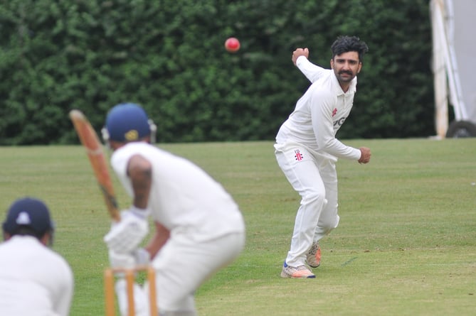 Devon Cricket League A Division.   Abbotskerswell versus Thorverton. Abbotskerswell bowler Inder Singh