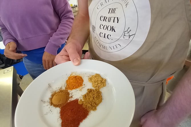 A plate of spices with the Crafty Cook CIC