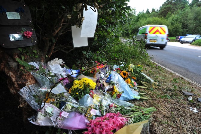 Floral tributes left at the site on the unclassfied road linking Haldon Hill and Telegraph Hill where two teenagers died  following a single vehicle RTC on August 8