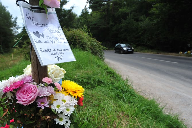 Floral tributes left at the site on the unclassfied road linking Haldon Hill and Telegraph Hill where two teenagers died  following a single vehicle RTC on August 8