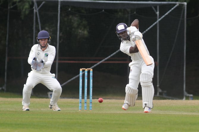 Devon Cricket League Premier Division.  Bovey Tracey versus Bradninch & Kentisbeare. Bovey's Musa Twala and Bradninch 'keeper Justin Wubbeling