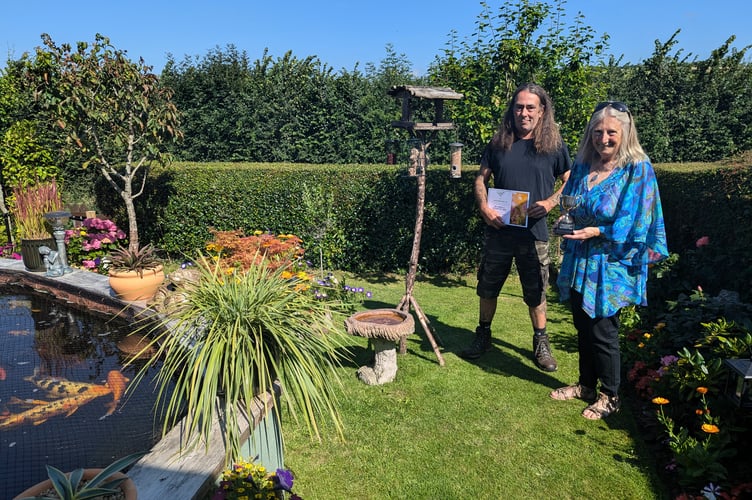 Mark Woodyear-Smith and Pamela Swindale won the individual garden prize in the 2024 Teign Housing in Bloom competition.