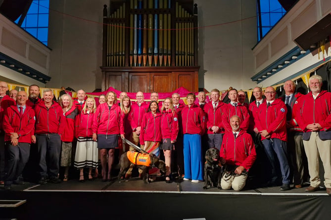 Dartmoor Search and Rescue team receive King's Coronation Medals at Ashburton Arts Centre. Photo DSAR 