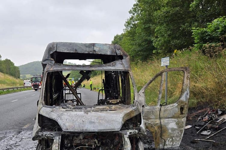 The burnt out remains of the van on the A38. Photo: Bovey Tracey Fire Station