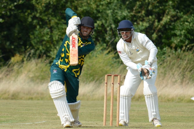 Bovey Tracey batsman Sam Russell goes after the Torquay bowling in the Aaron Printers Cup final. Russell 46 runs from 33 balls later earned him the man-of-the-match award in his side's 11-run win 