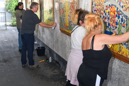 Artists brush off graffiti vandalism