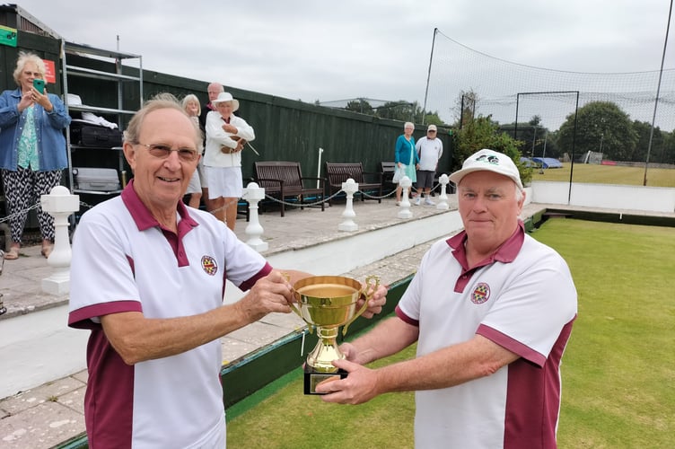 Chudleigh Bowls' men's club champion David Smethurst is presented with her trophy