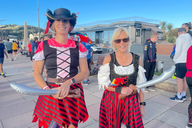 Katie Mowll and Linda Diggines in pirate dress for the 6th anniversary of Teignmouth Promenade parkrun